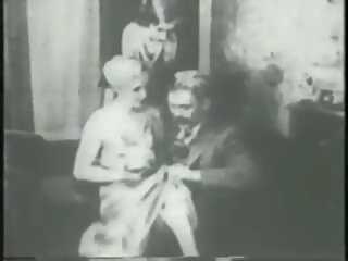 Two flappers dance naked with dude then rub and tug his manhood together