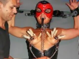 Fetish sex film with masked muscle milf
